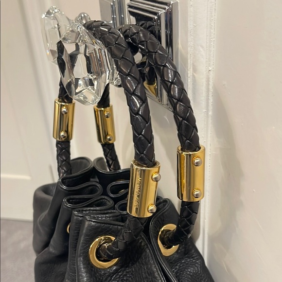 Michael Kors Black Hobo Bag with Gold Accents - Picture 3 of 8